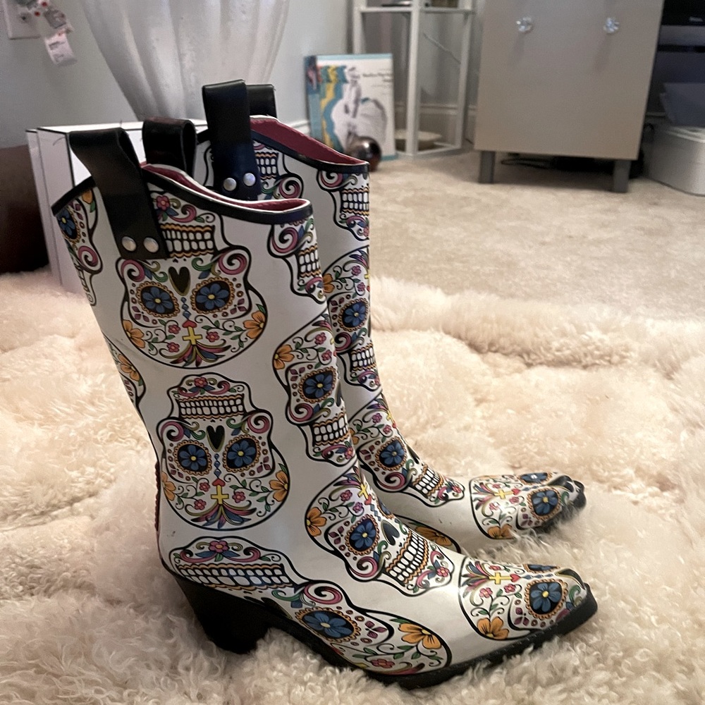 Taylor swift boots with her name in stones on back
